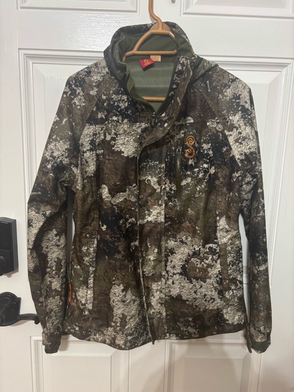 She camouflage multipurpose jacket with multiple pockets and hood